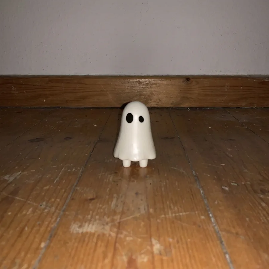 woo standing alone on a bare home floor